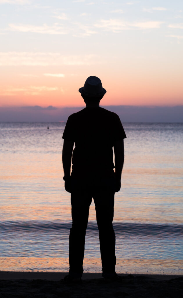 silhouette of man at the beach at sunset -schizoaffective disorder treatment in orange county california