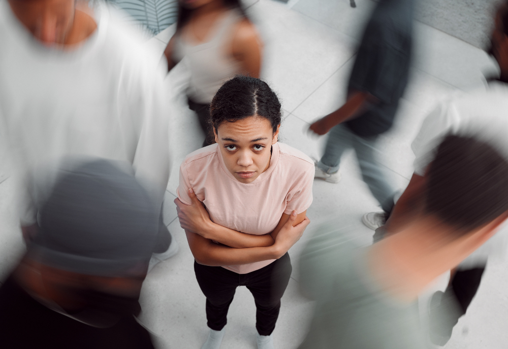 woman in crowd experiencing a silent panic attack - silent panic attacks