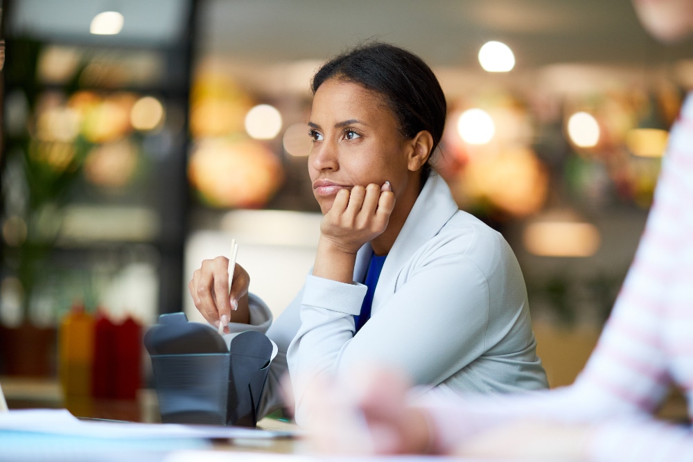 woman struggling with intrusive and impulsive thoughts - intrusive vs impulsive thoughts